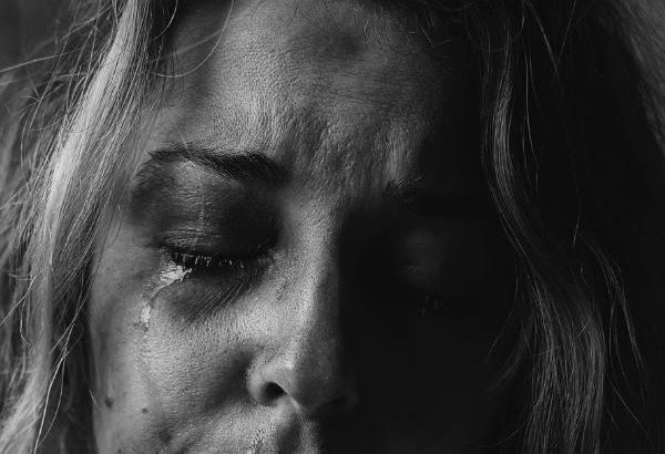 woman suffering with anxiety symptoms