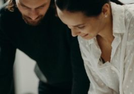 couple discussing adding profit to a home business